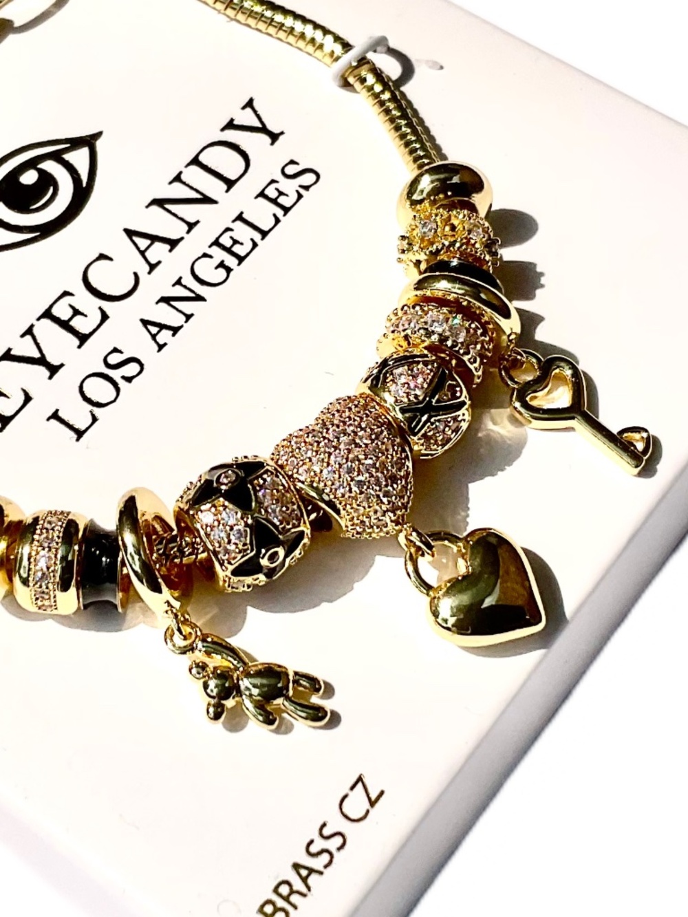 Eye Candy Faux Stone Gold-Tone Charm Bracelet